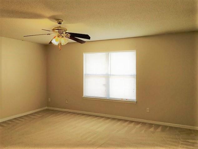 134 Sandstone Trail Crestview, FL 32539 - Photo 9 of 18 an empty room with a window