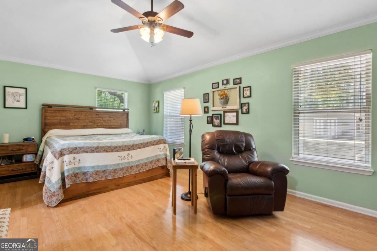 100 Longwood Road St. Marys, GA 31558 - Photo 16 of 39 a bedroom with a bed and a couch