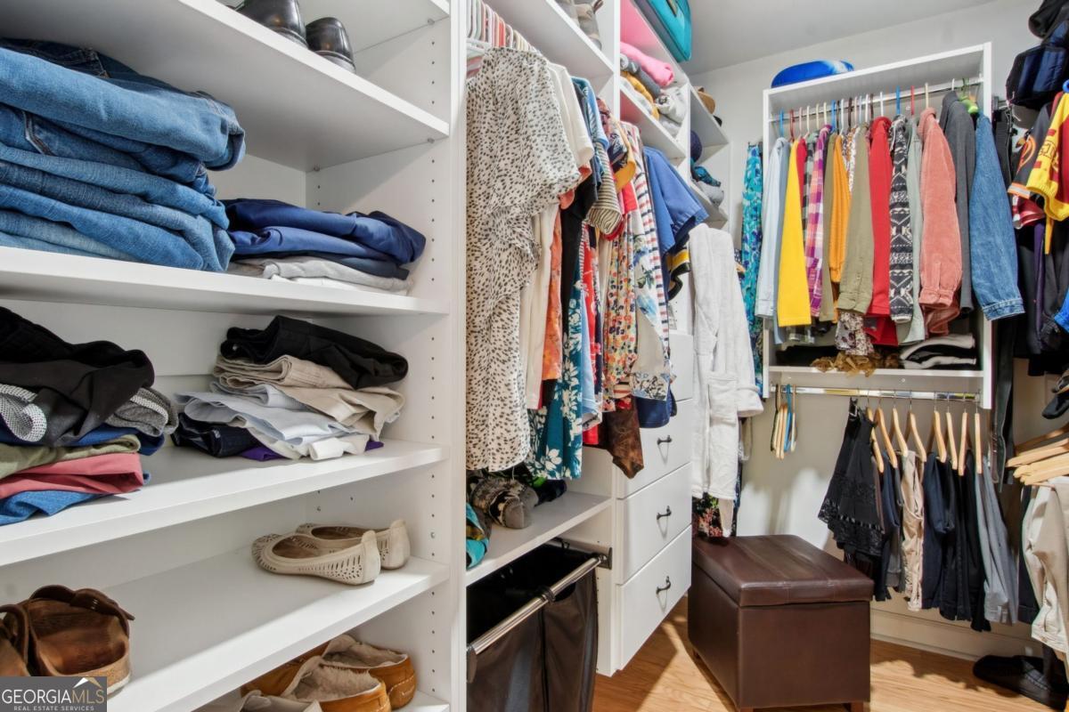 100 Longwood Road St. Marys, GA 31558 - Photo 20 of 39 a view of walk in closet with clothes and shoes