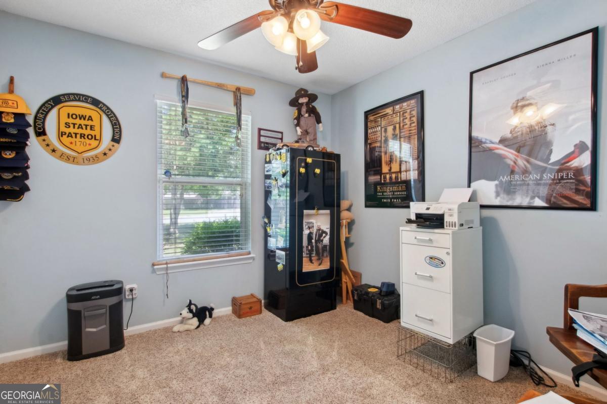 100 Longwood Road St. Marys, GA 31558 - Photo 23 of 39 a view of a workspace with furniture and a window