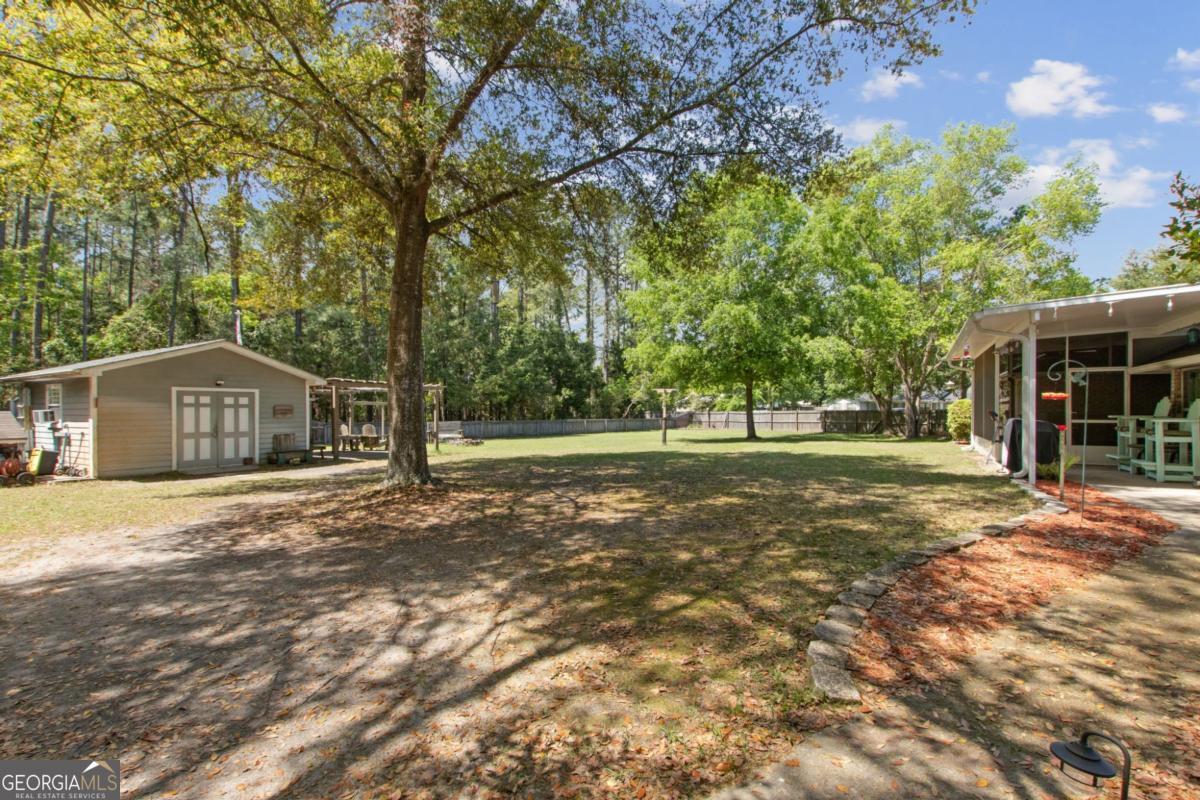 100 Longwood Road St. Marys, GA 31558 - Photo 33 of 39 a view of a house with yard and tree s