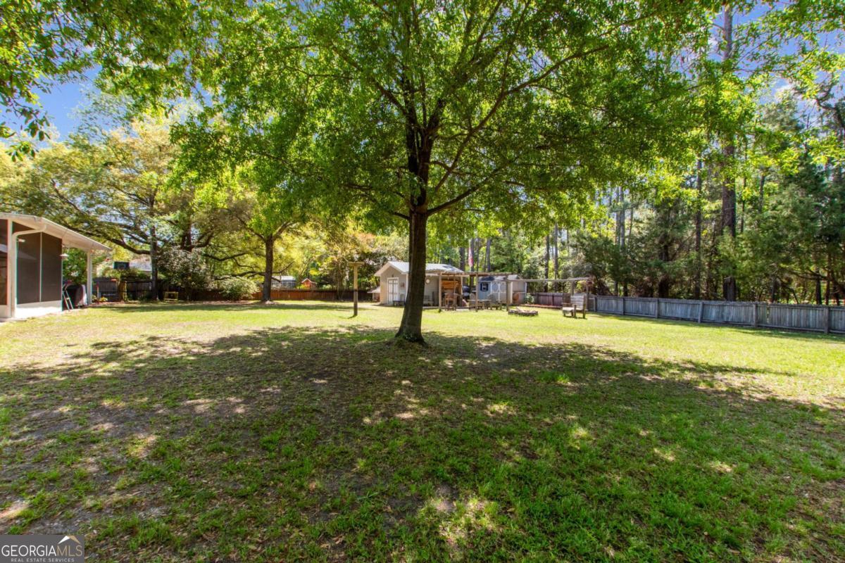 100 Longwood Road St. Marys, GA 31558 - Photo 35 of 39 a view of yard with trees