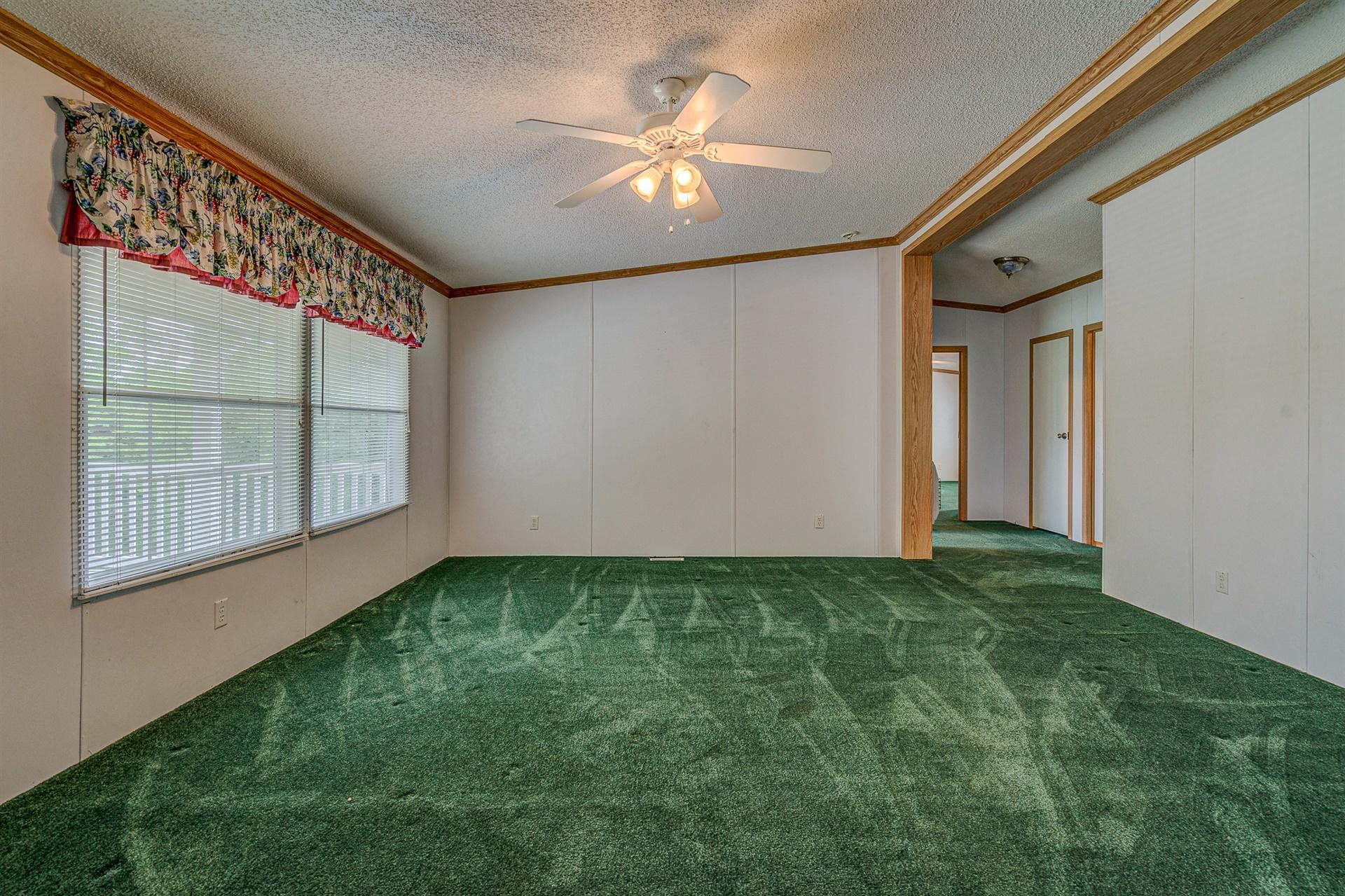 2930 Runnett Bag Road Ferrum, VA 24088 - Photo 7 of 42 a view of an empty room with a window