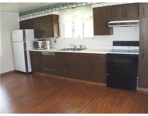 900 Lovedale Road Elizabeth, PA 15037 - Photo 4 of 15 Kitchen. Spacious, Fully equipped kitchen with new laminate floor.