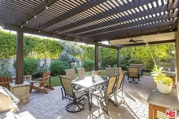a dining area with furniture and outdoor view