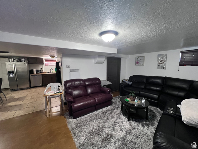 174 North 500 East Logan, UT 84321 - Photo 13 of 32 Basement Living Room