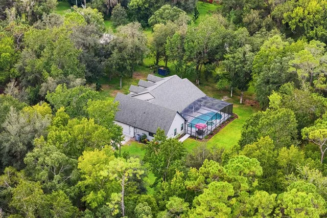 a view of a yard with an outdoor space
