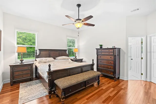 a spacious bathroom with a bathtub and shower