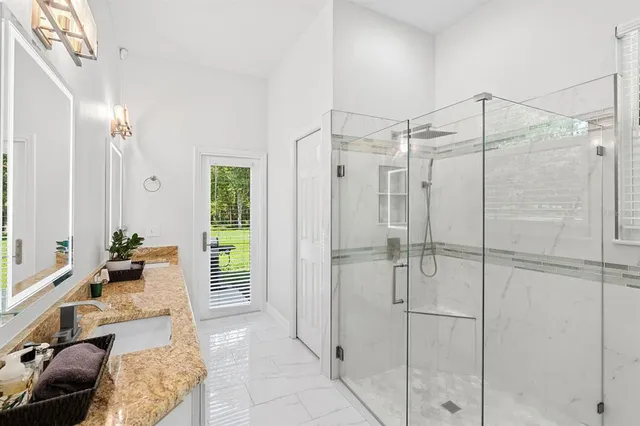 a view of a livingroom with furniture and window