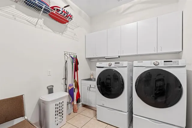 a house view with swimming pool in front of it