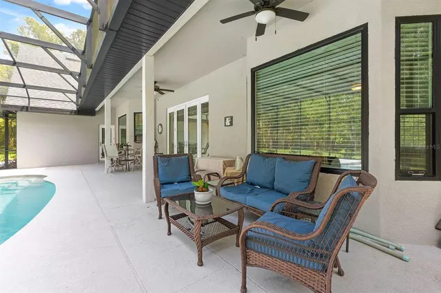 a view of a field with trees
