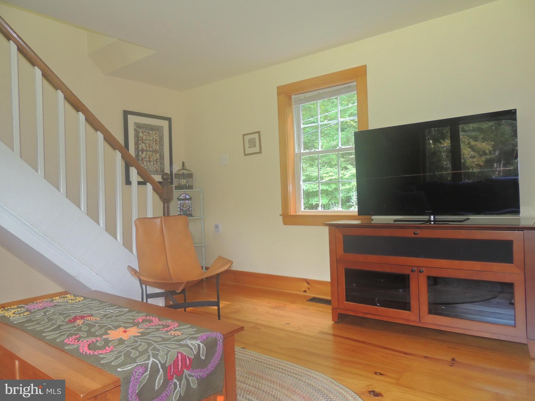 1316 Watervale Road Fallston, MD 21047 - Photo 7 of 30 a living room with a flat screen tv and a fireplace
