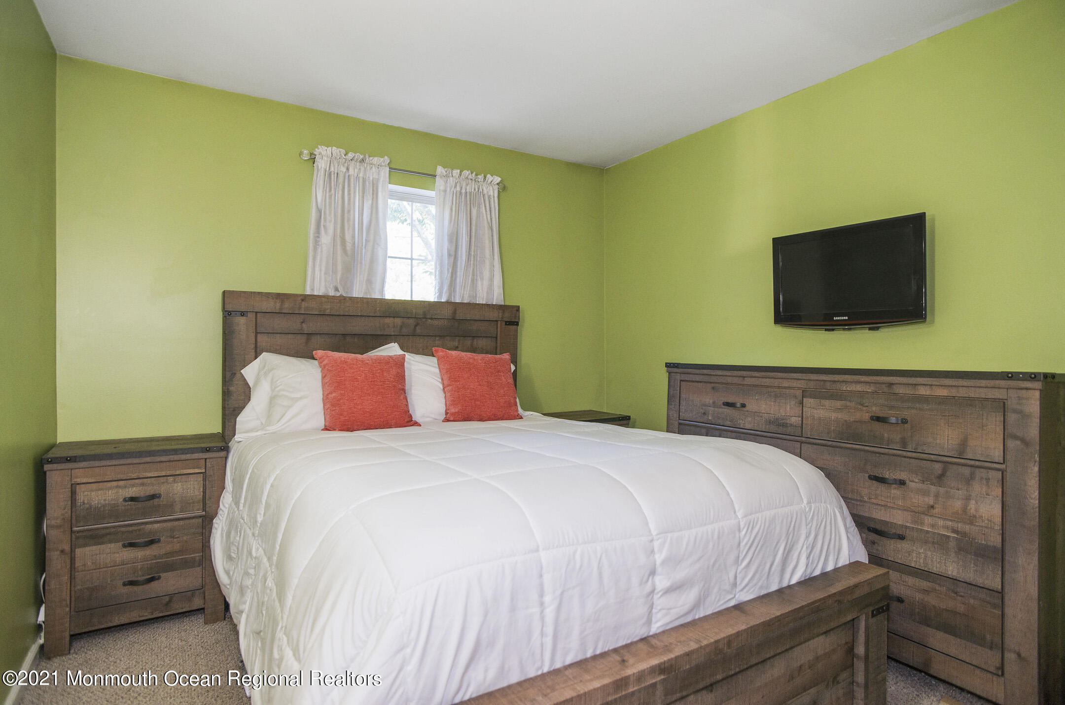 44 Prestwick Road Manalapan, NJ 07726 - Photo 11 of 15 a bedroom with a bed and a flat screen tv