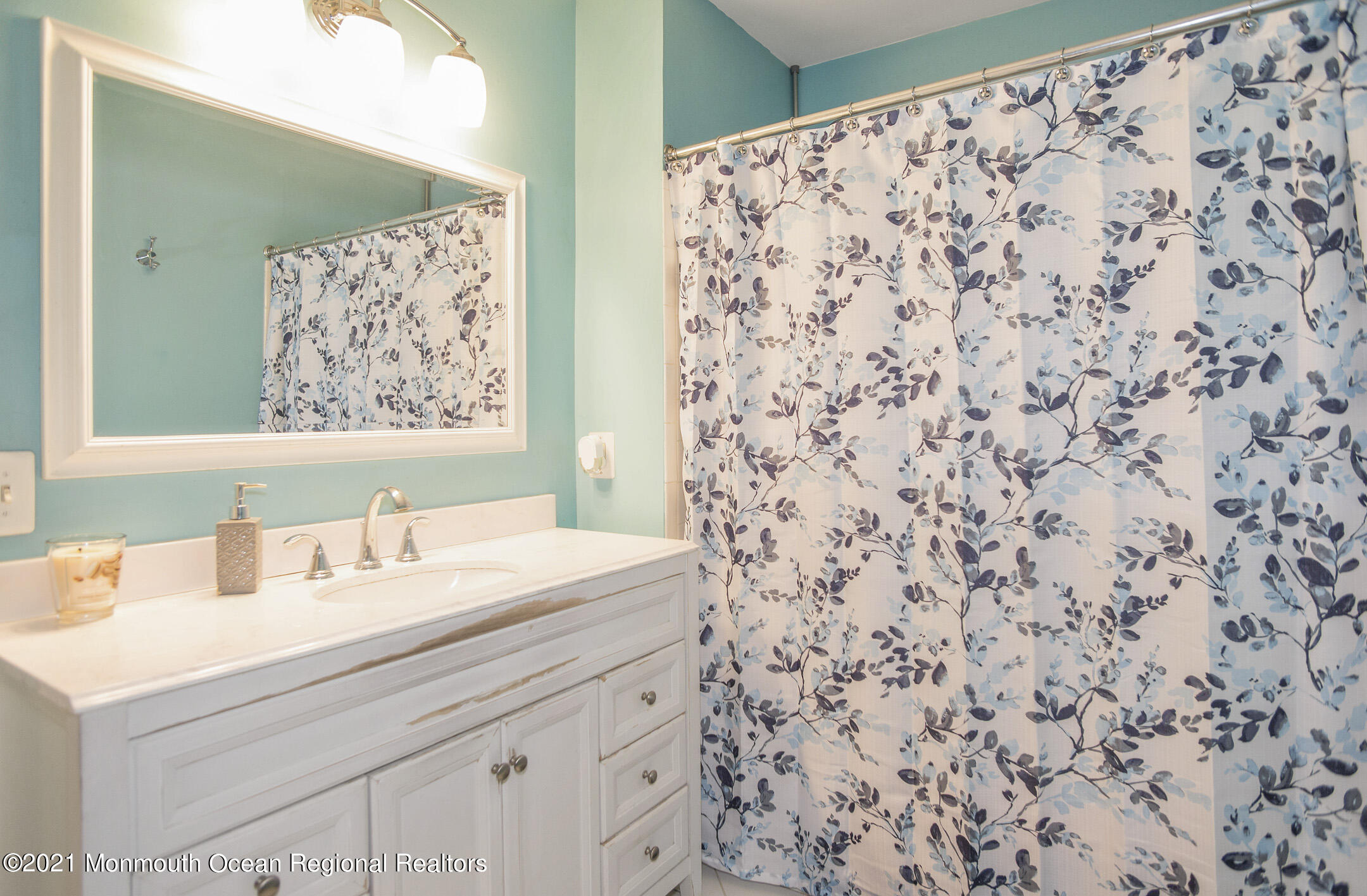 44 Prestwick Road Manalapan, NJ 07726 - Photo 15 of 15 a bathroom with a sink and a mirror