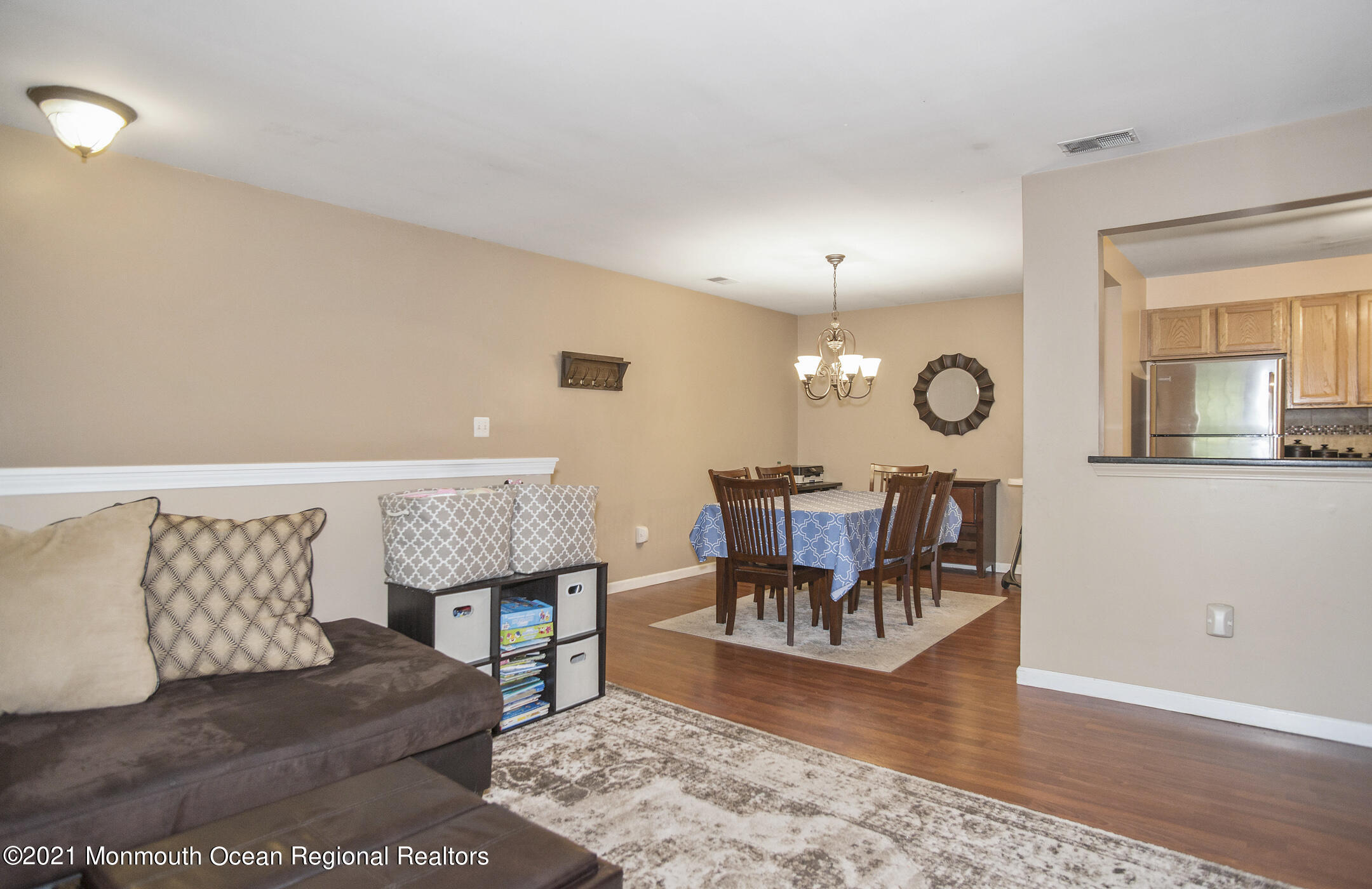 44 Prestwick Road Manalapan, NJ 07726 - Photo 4 of 15 a living room with furniture and a wooden floor