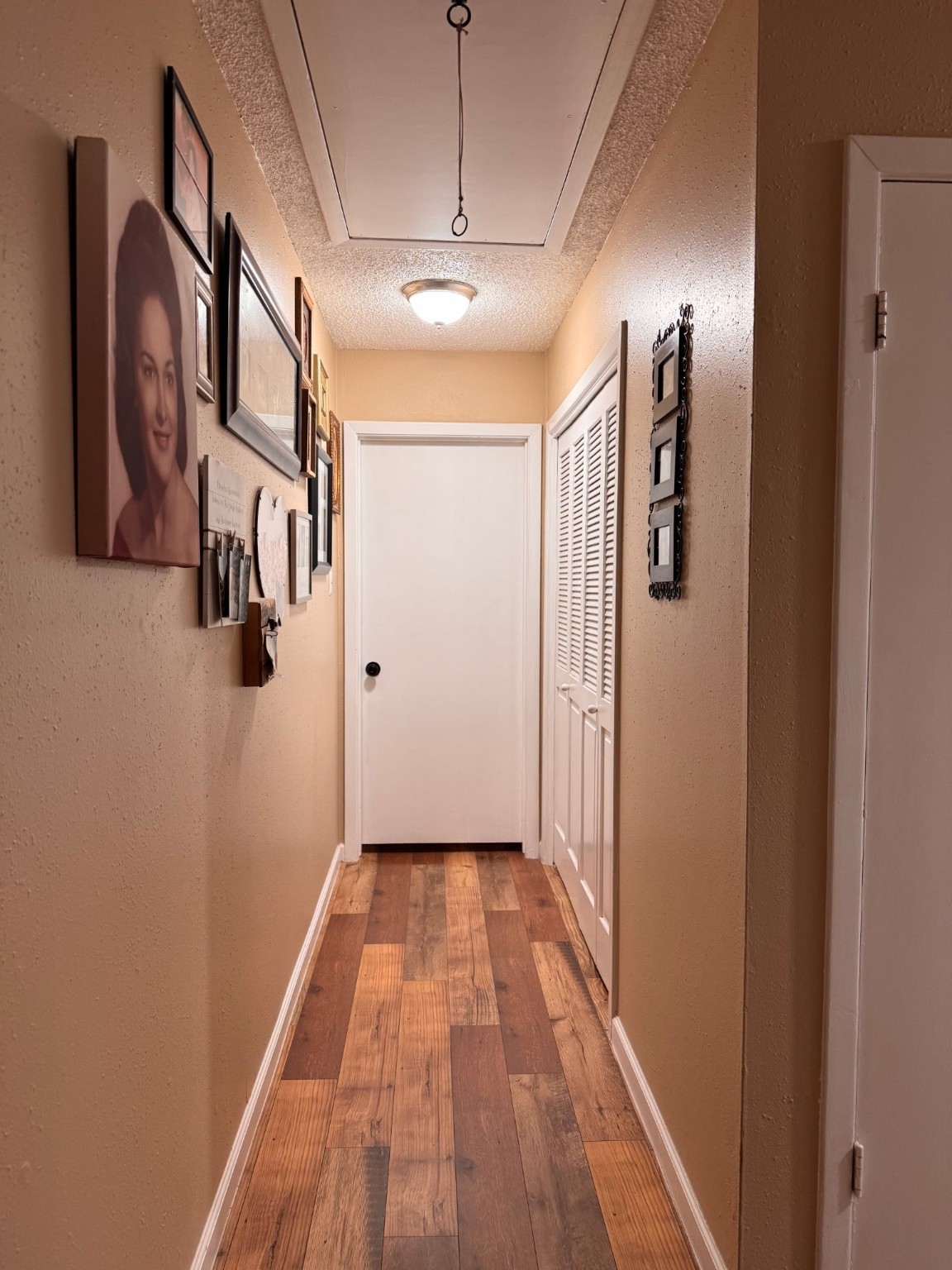 75 Coral Gables Trinity, TX 75862 - Photo 15 of 22 a view of a hallway with wooden floor