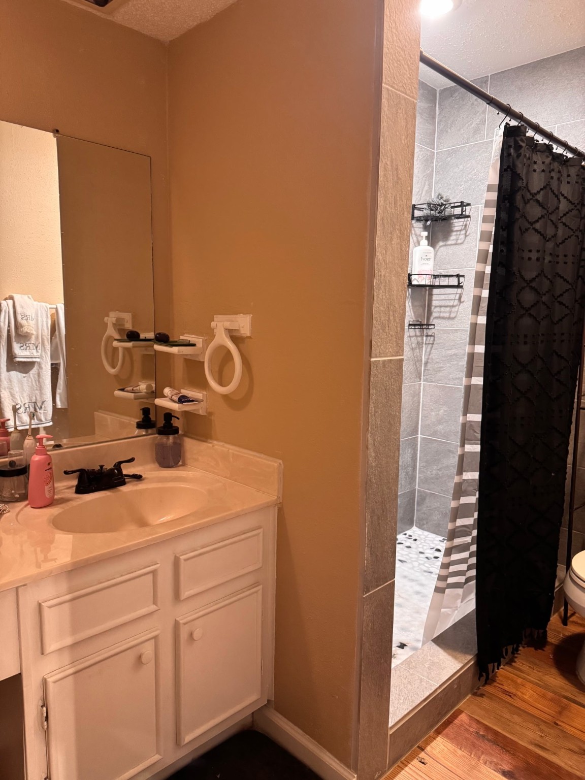 75 Coral Gables Trinity, TX 75862 - Photo 16 of 22 a bathroom with a sink and a mirror