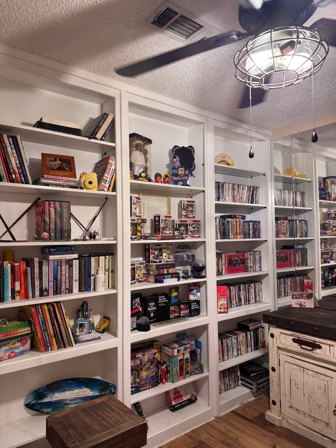 75 Coral Gables Trinity, TX 75862 - Photo 17 of 22 a view of a book shelf with lots of books