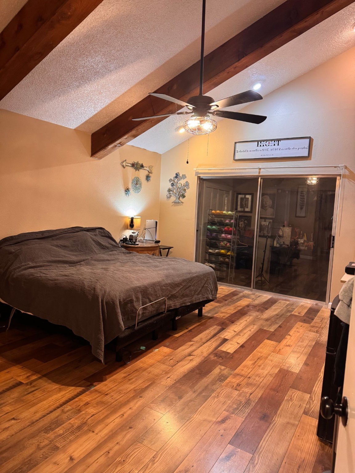 75 Coral Gables Trinity, TX 75862 - Photo 9 of 22 a bedroom with a bed mirror and a walk in closet
