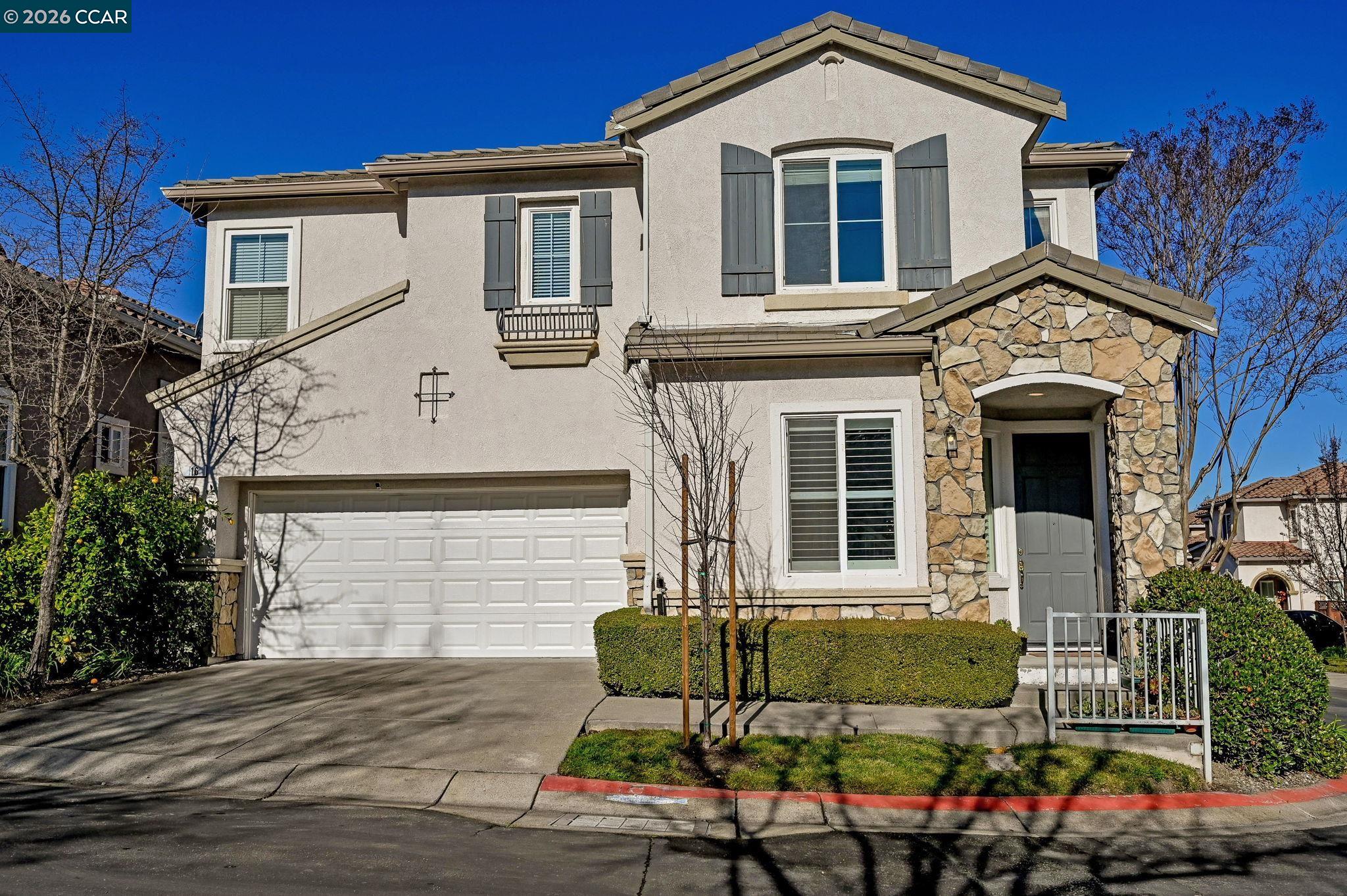 16 Poppy Hills Lane San Ramon, CA 94583 - Photo 1 of 30 a front view of a house with outdoor space