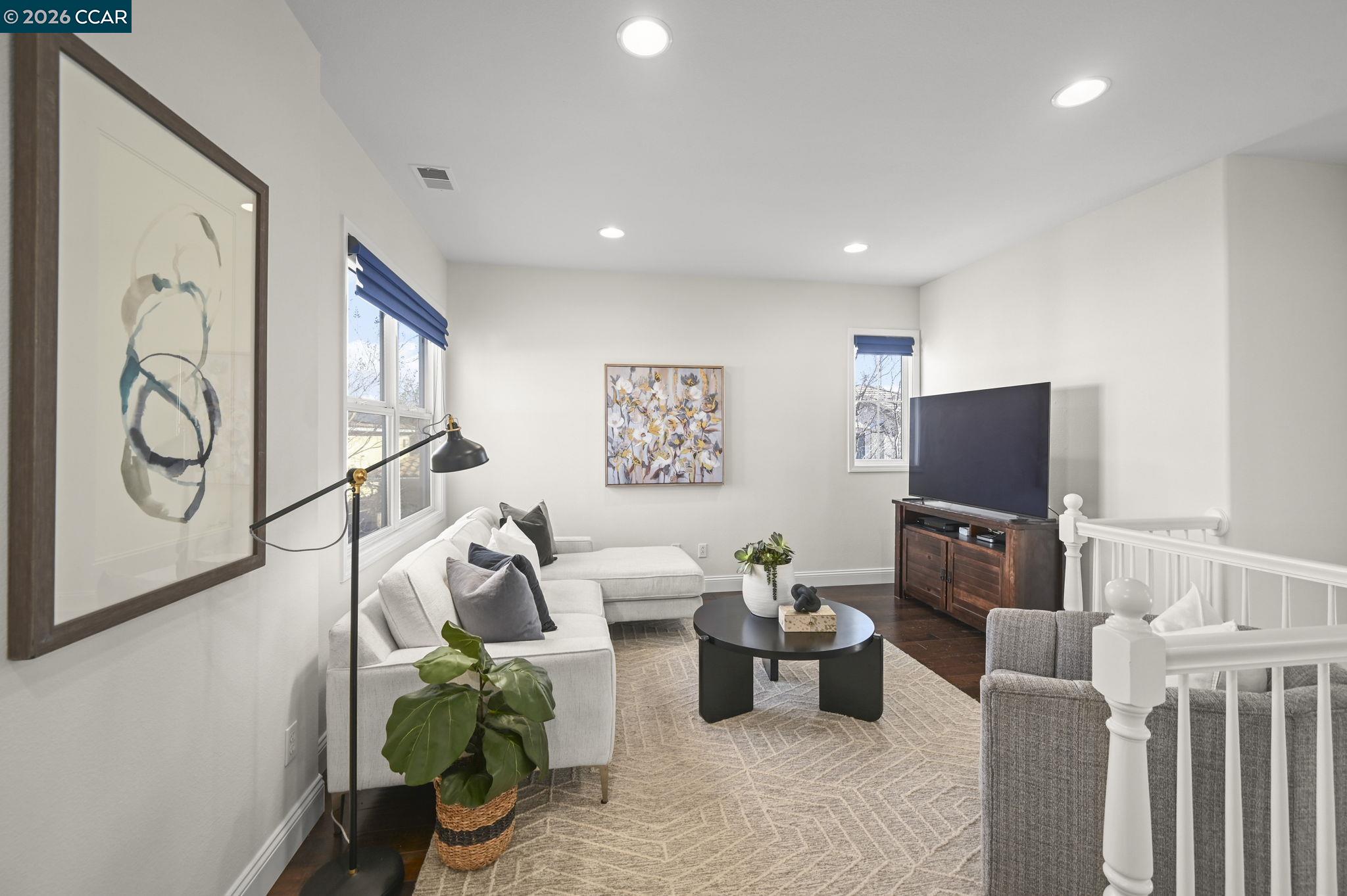 16 Poppy Hills Lane San Ramon, CA 94583 - Photo 15 of 30 a living room with furniture and a flat screen tv