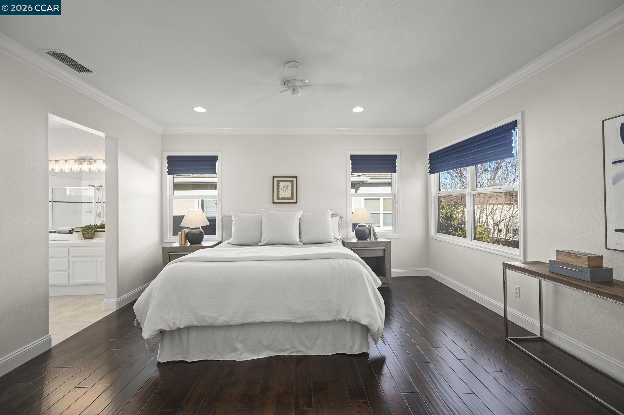 16 Poppy Hills Lane San Ramon, CA 94583 - Photo 16 of 30 a spacious bedroom with a bed and wooden floor