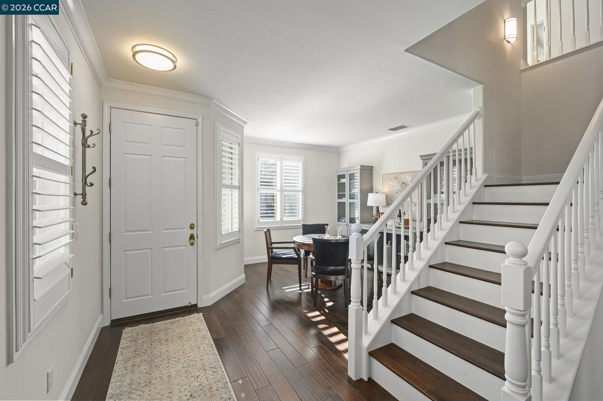 16 Poppy Hills Lane San Ramon, CA 94583 - Photo 2 of 30 a view of entryway with wooden floor and stairs