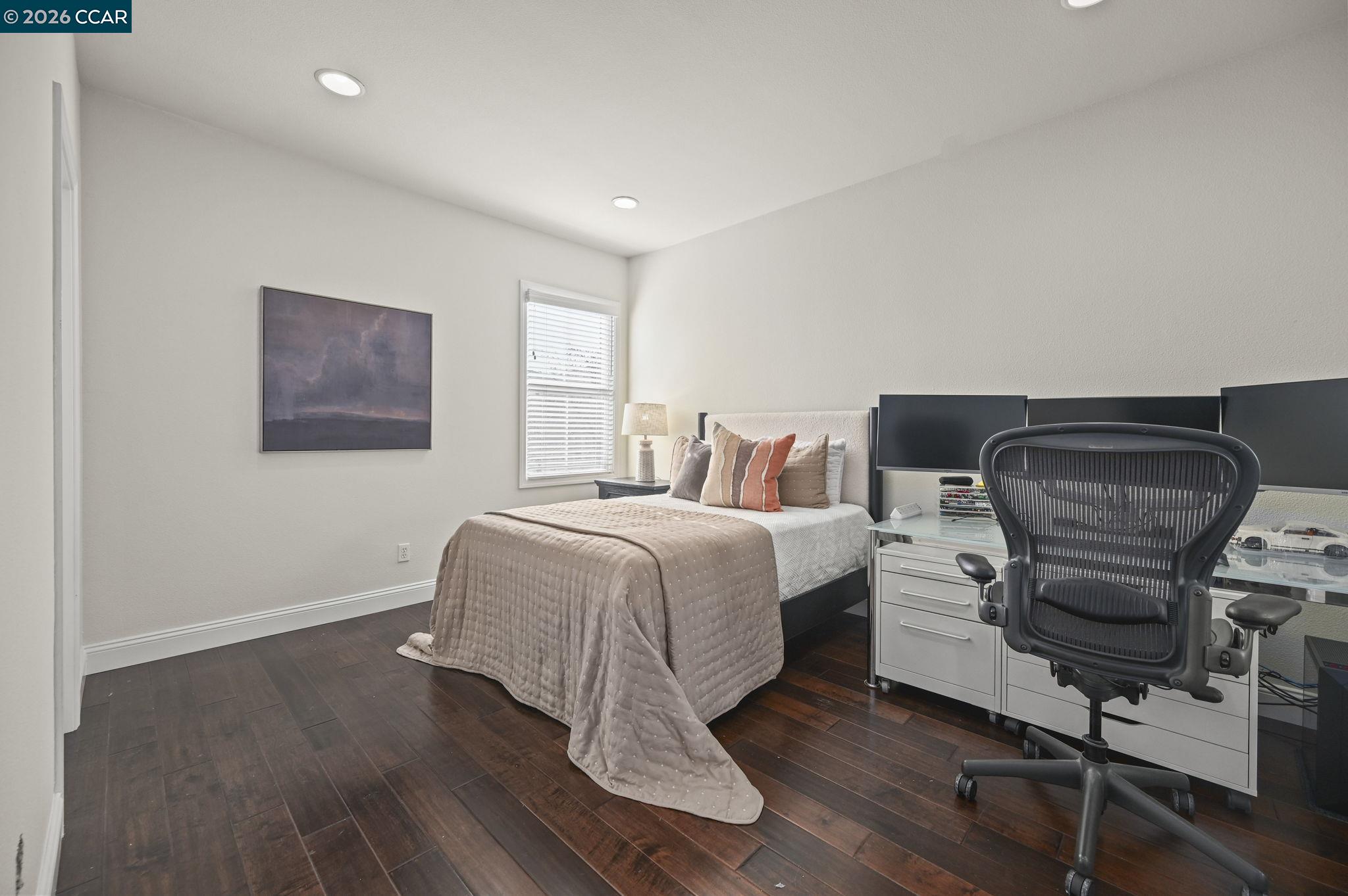 16 Poppy Hills Lane San Ramon, CA 94583 - Photo 21 of 30 a bedroom with a bed and wooden floor