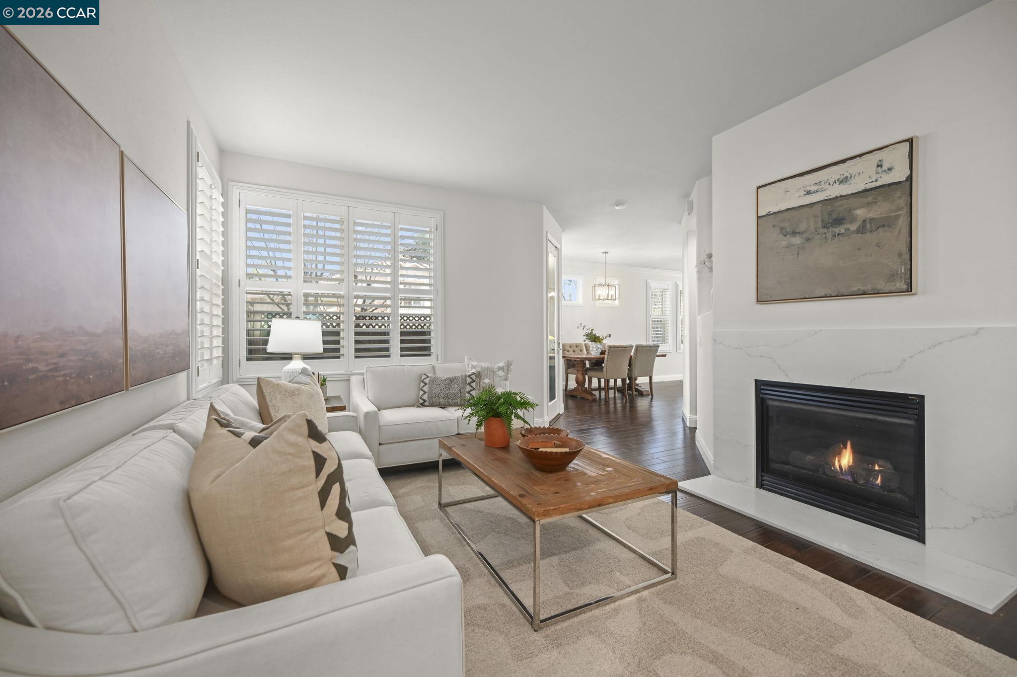16 Poppy Hills Lane San Ramon, CA 94583 - Photo 7 of 30 a living room with furniture and a fireplace