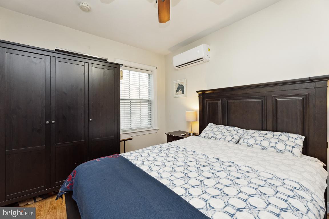 428 8th Street Southeast, Unit A Washington, DC 20003 - Photo 14 of 23 a bedroom with a bed and a window