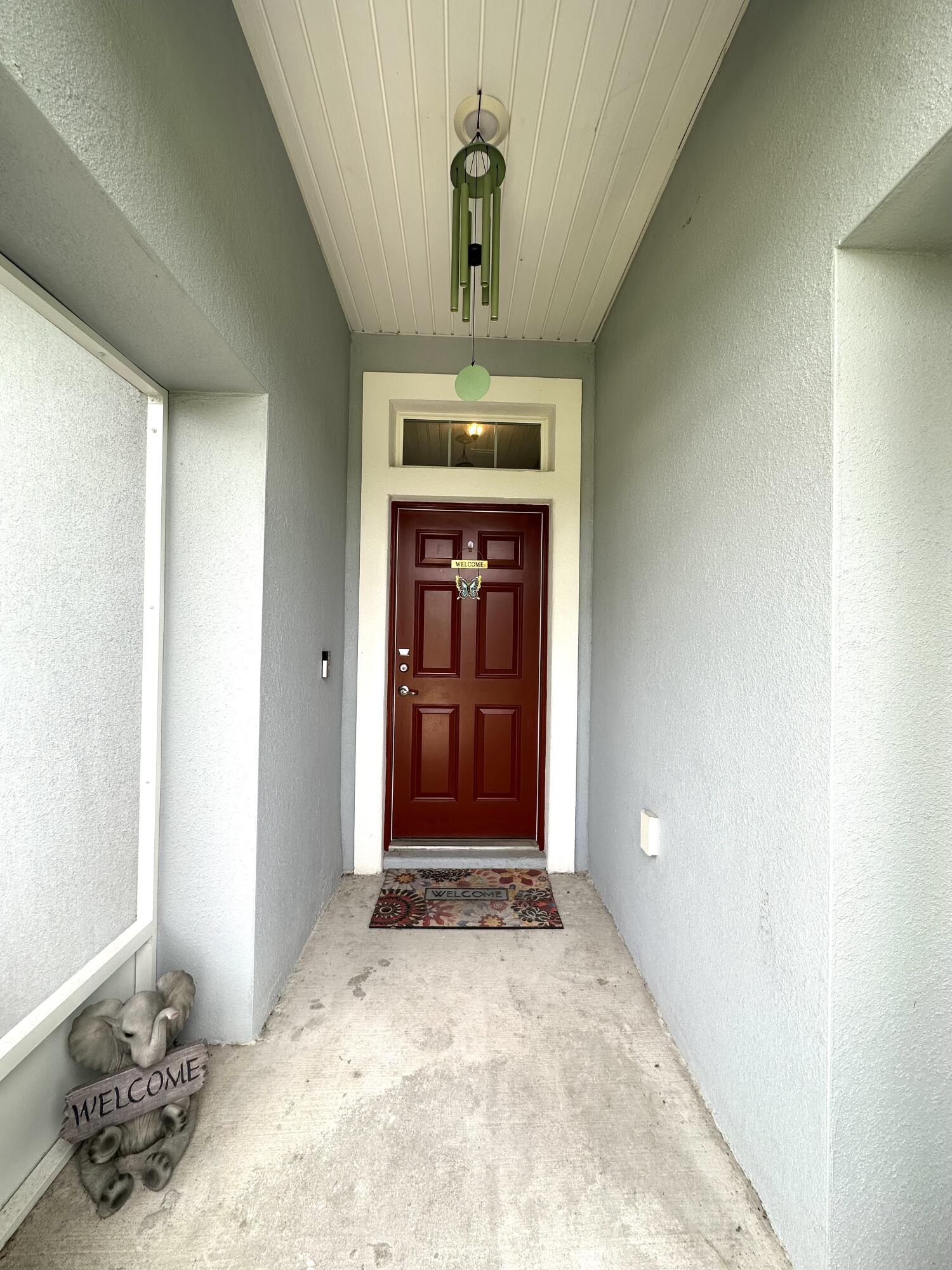 15329 Southwest 65th Ter Road Ocala, FL 34473 - Photo 25 of 28 Enclosed Screened-In Front Entrance