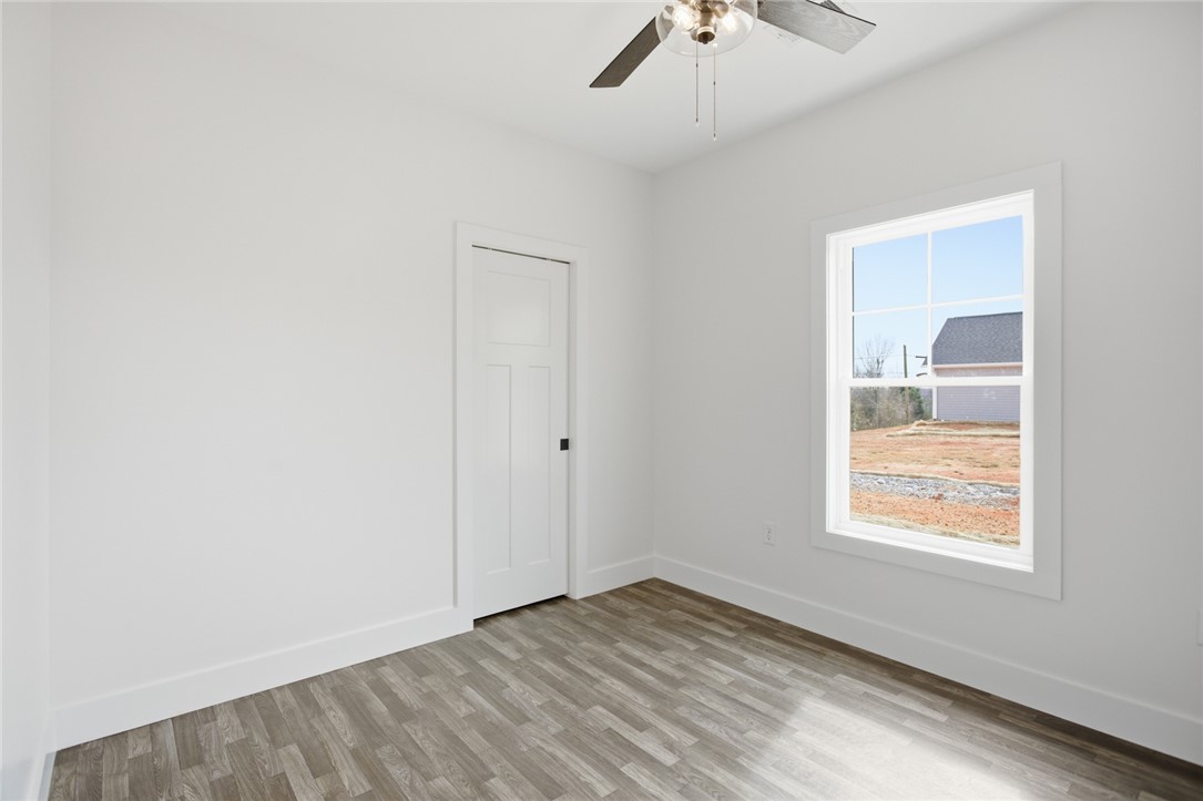 115 Riley Street Westminster, SC 29693 - Photo 23 of 46 Bright and airy, this room features durable flooring and a window with views.