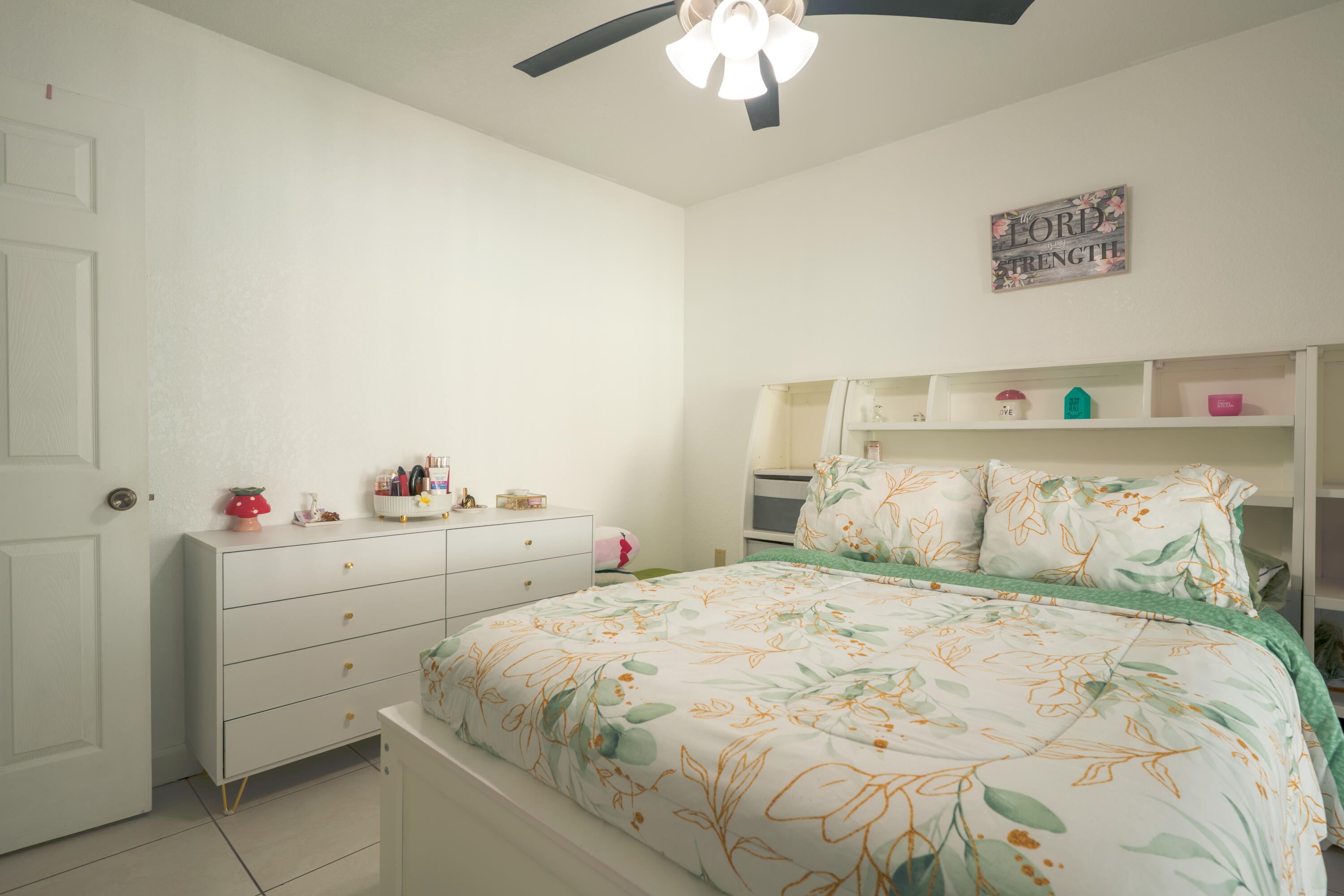 13257 Southwest 277th Terrace Homestead, FL 33032 - Photo 14 of 24 a bedroom with a bed and a chandelier