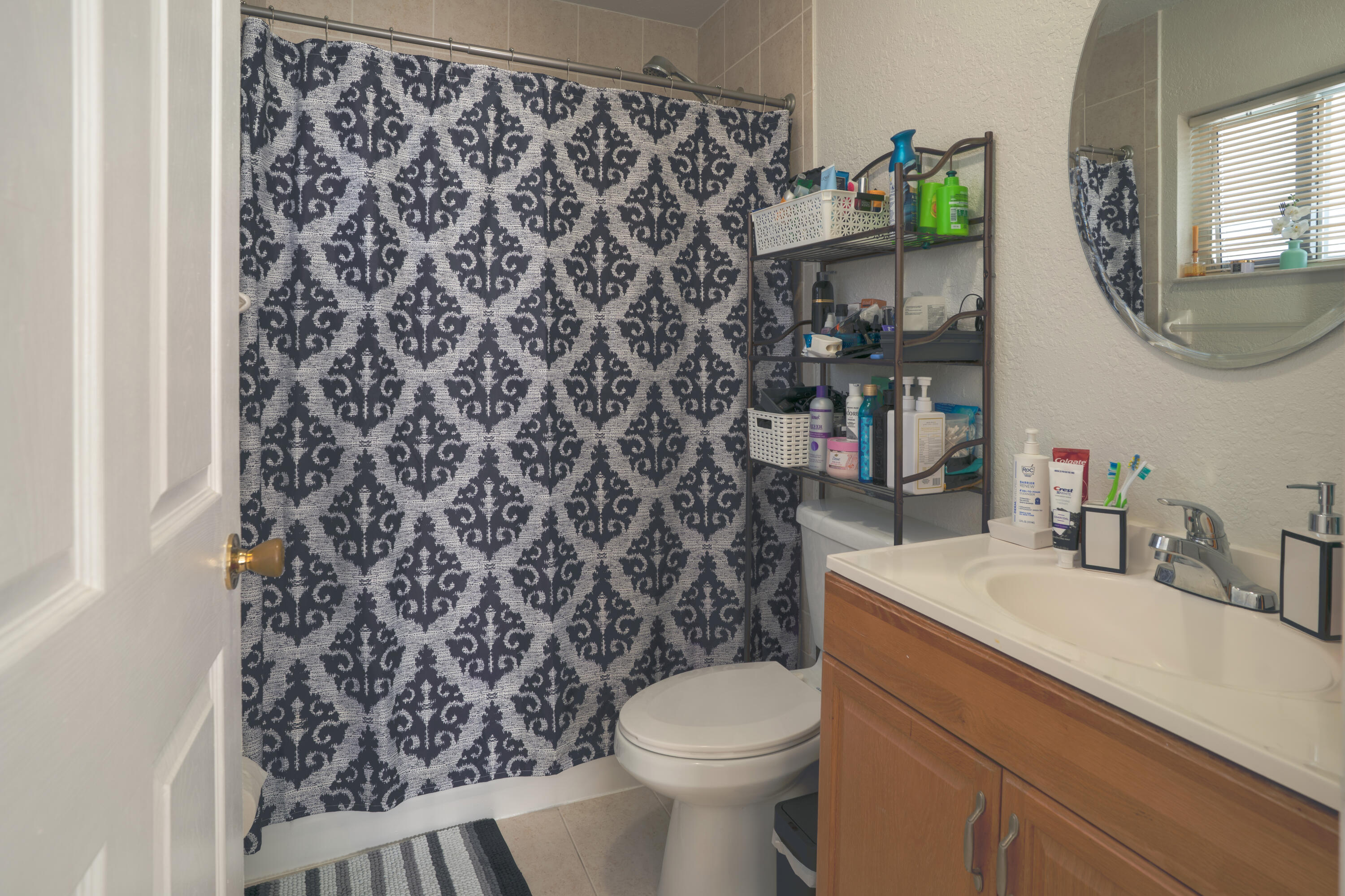 13257 Southwest 277th Terrace Homestead, FL 33032 - Photo 18 of 24 a bathroom with a sink toilet and shower