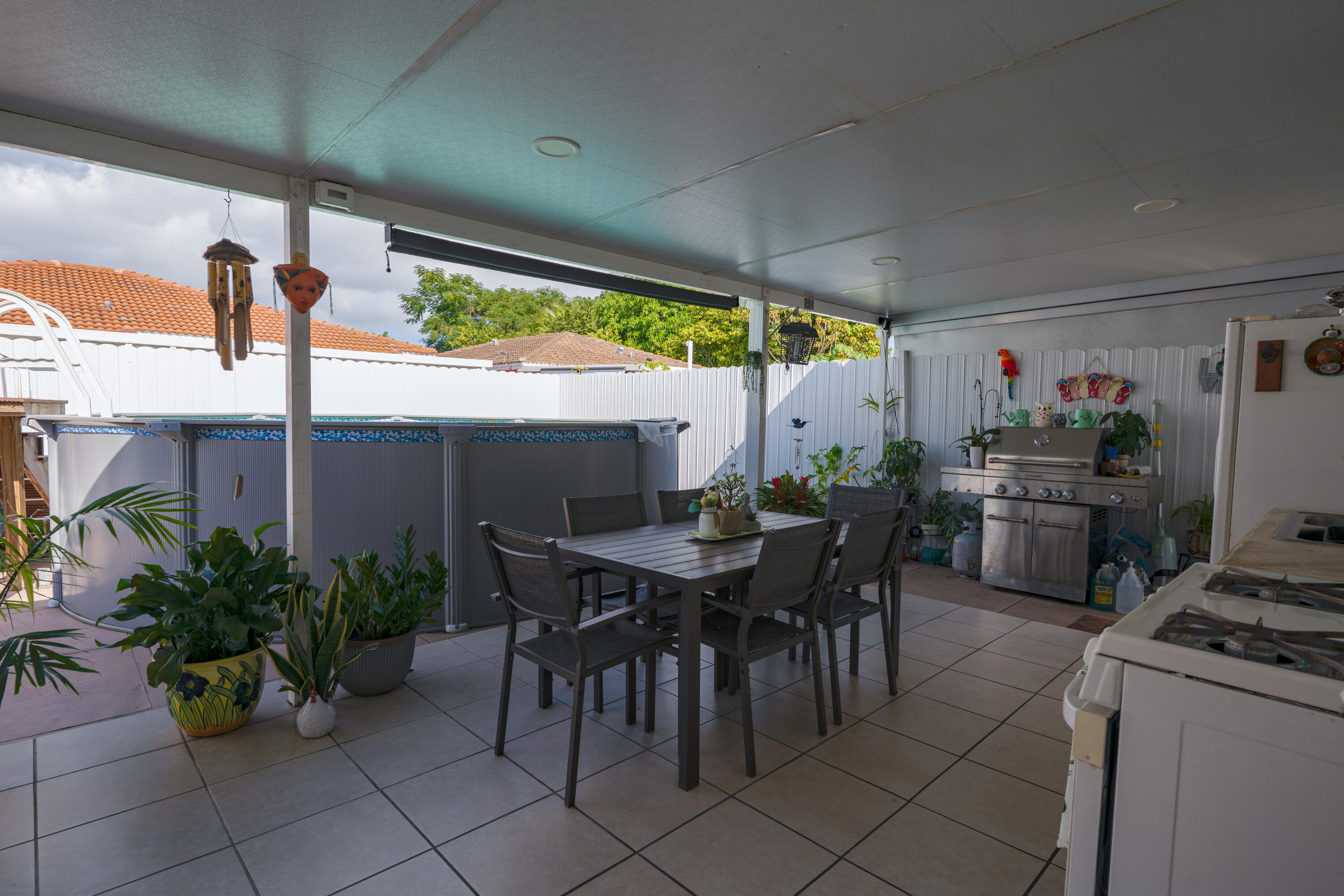 13257 Southwest 277th Terrace Homestead, FL 33032 - Photo 23 of 24 a outdoor dining space with furniture