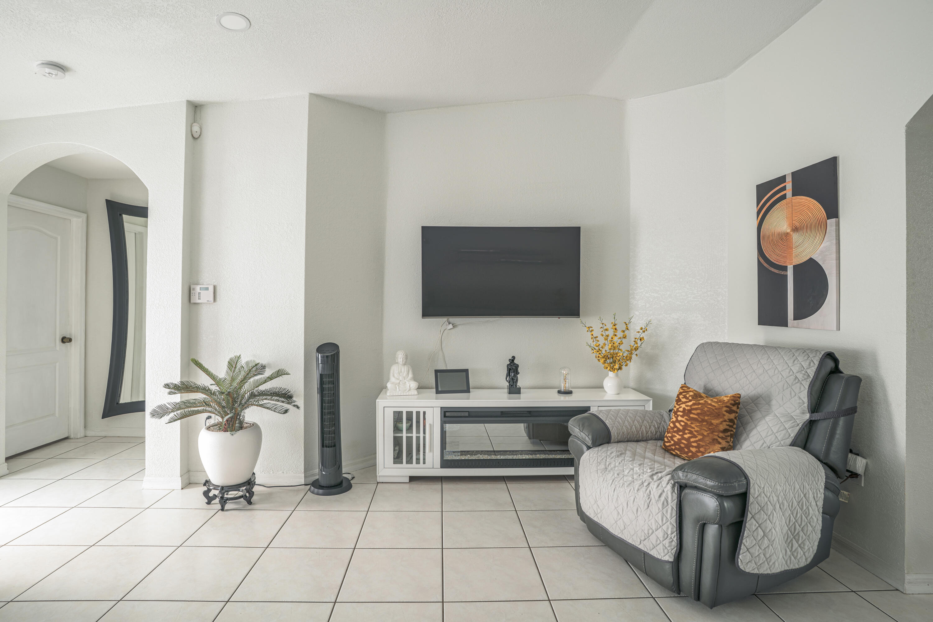 13257 Southwest 277th Terrace Homestead, FL 33032 - Photo 6 of 24 a living room with furniture and a flat screen tv