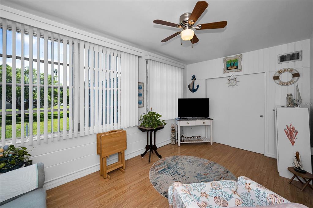 2043 Denmark Street, Unit 39 Clearwater, FL 33763 - Photo 13 of 37 a living room with furniture and a window