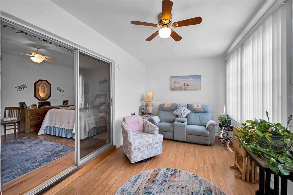 2043 Denmark Street, Unit 39 Clearwater, FL 33763 - Photo 14 of 37 a living room with furniture and a window