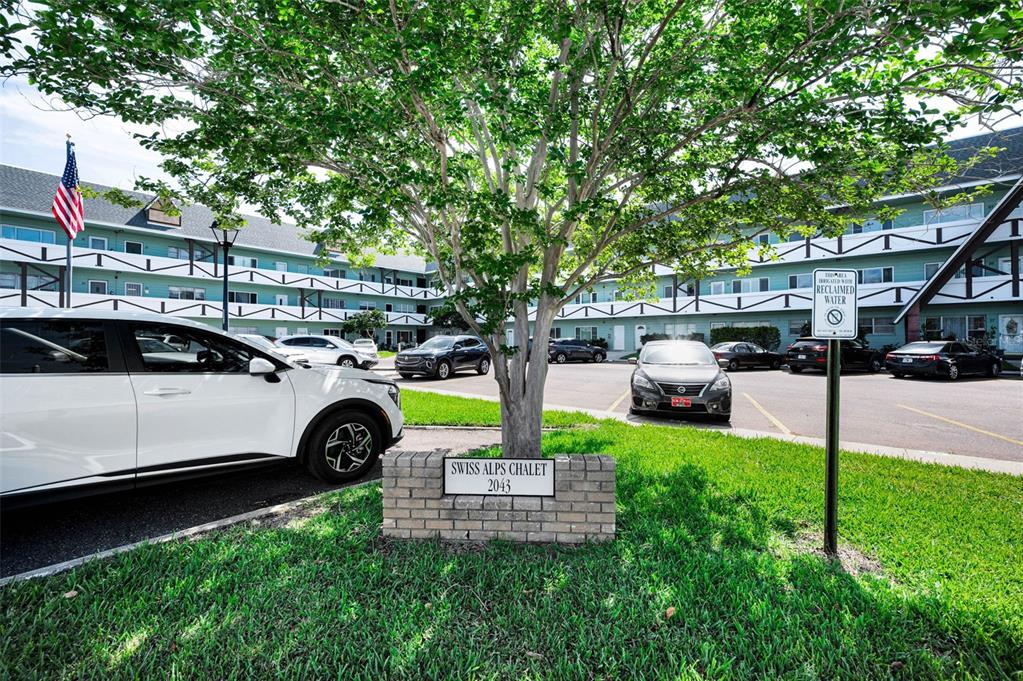 2043 Denmark Street, Unit 39 Clearwater, FL 33763 - Photo 2 of 37 a view of a yard with car parked