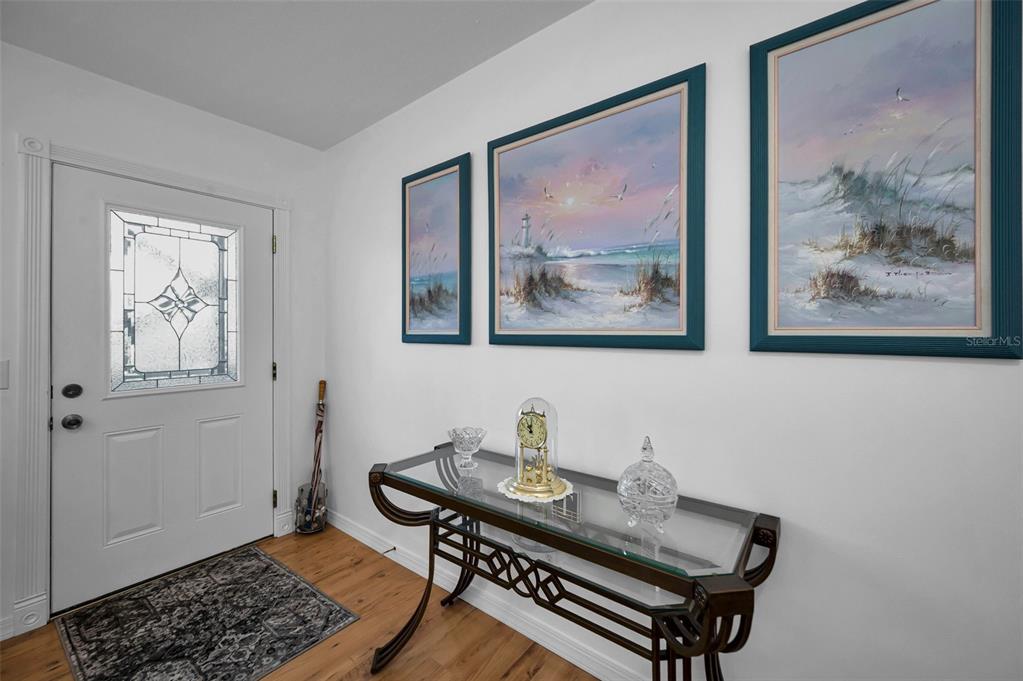 2043 Denmark Street, Unit 39 Clearwater, FL 33763 - Photo 4 of 37 a view of a workspace with furniture and wooden floor