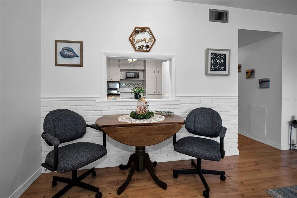 2043 Denmark Street, Unit 39 Clearwater, FL 33763 - Photo 8 of 37 a living room with furniture and a fireplace