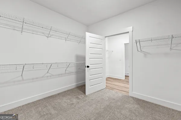 a view of an empty walk in closet