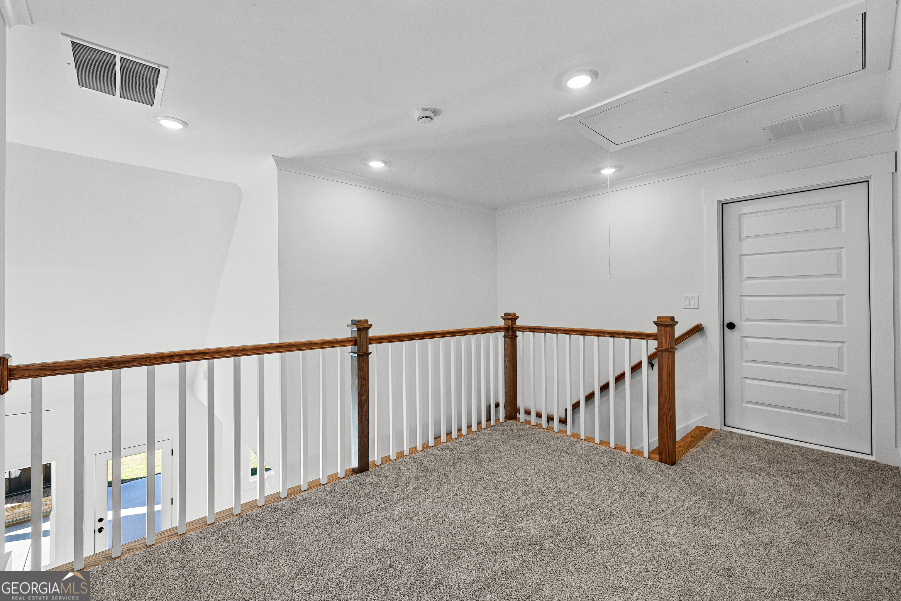 374 Conner Lane Williamson, GA 30292 - Photo 33 of 52 a view of a hallway with staircase