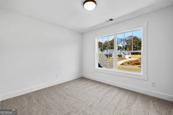 an empty room with window