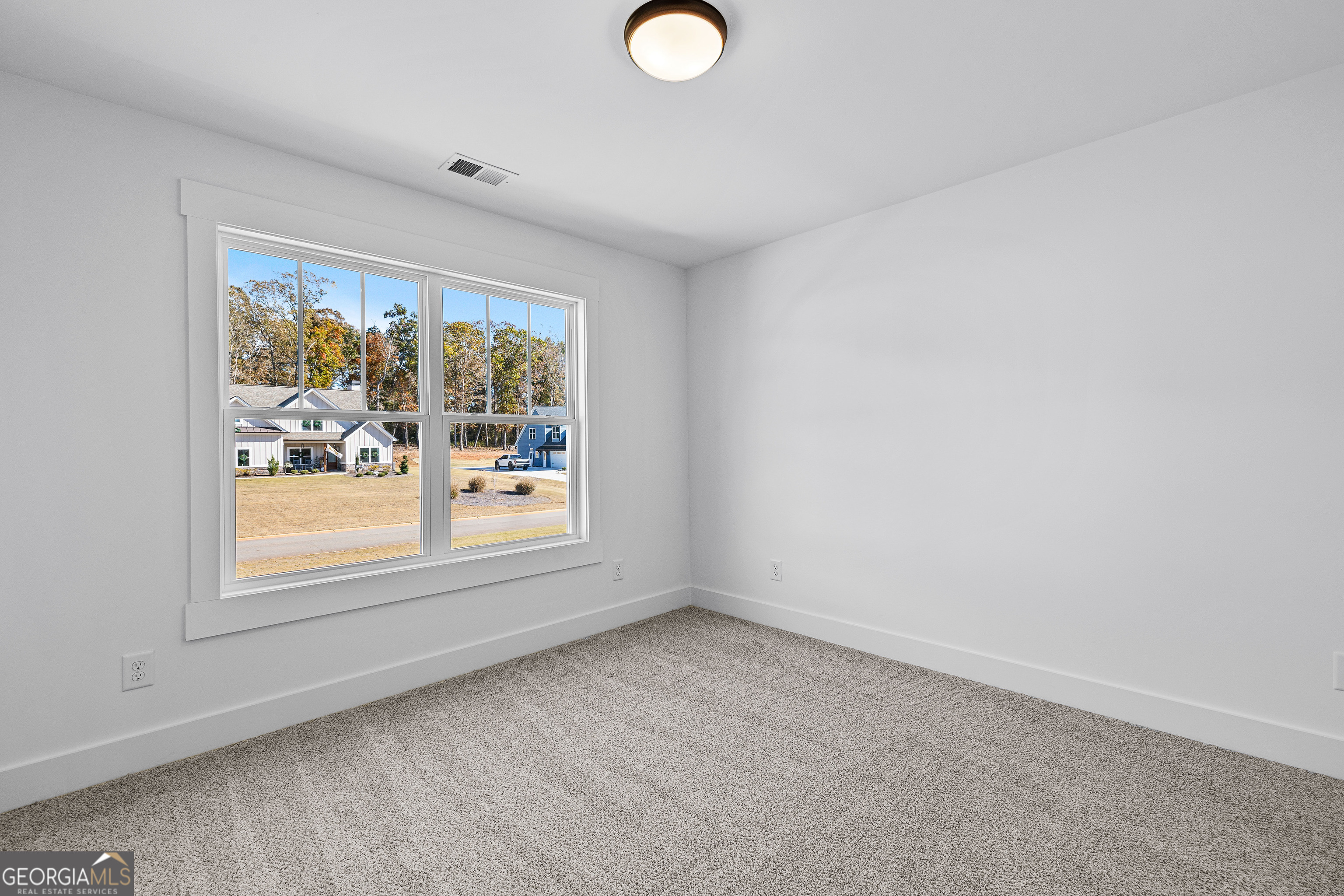 374 Conner Lane Williamson, GA 30292 - Photo 38 of 52 an empty room with a window