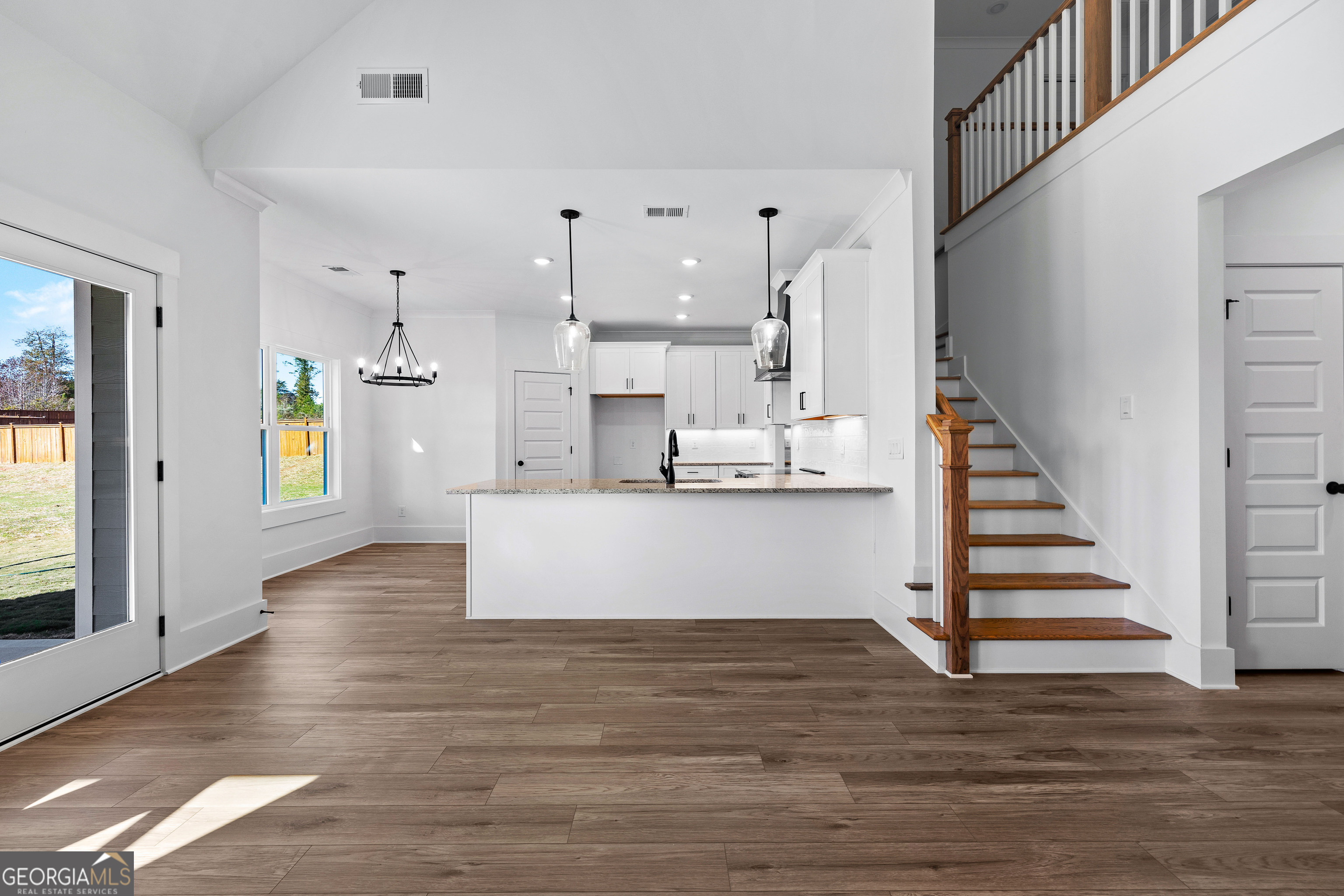 374 Conner Lane Williamson, GA 30292 - Photo 5 of 52 a view of kitchen with cabinets and wooden floor