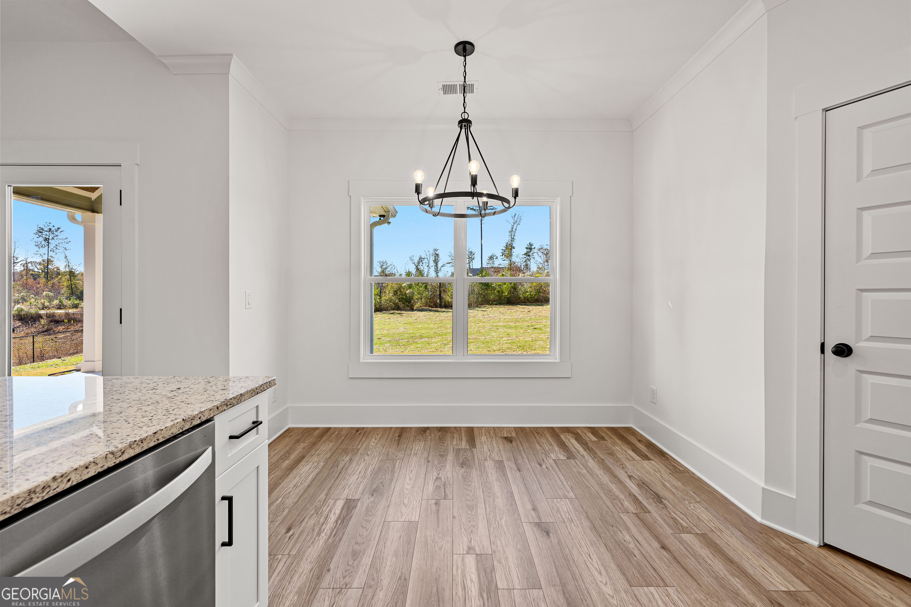 374 Conner Lane Williamson, GA 30292 - Photo 9 of 52 a view of a room with wooden floor and a window