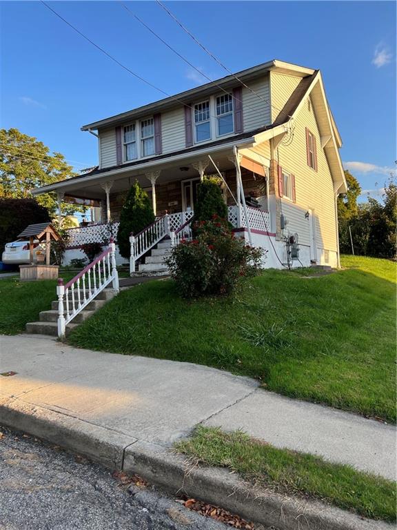 740 Chestnut Street New Castle, PA 16101 - Photo 3 of 16 a view of a house with a yard