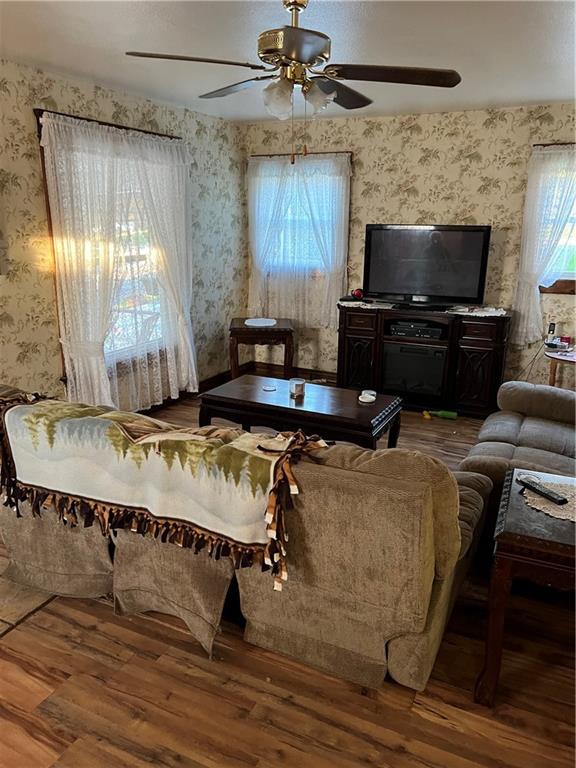 740 Chestnut Street New Castle, PA 16101 - Photo 6 of 16 a room with furniture and flat screen tv