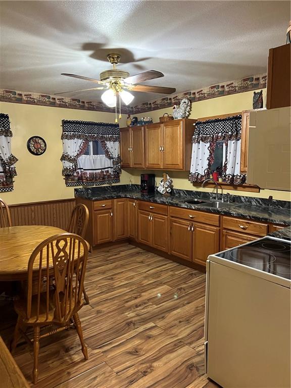 740 Chestnut Street New Castle, PA 16101 - Photo 8 of 16 a kitchen with stainless steel appliances granite countertop a sink a stove counter space and cabinets